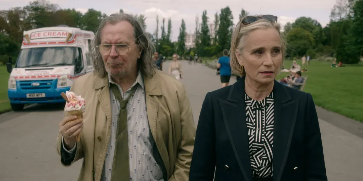 Kristin Scott Thomas in Apple TV's "Slow Horses" wearing a dazzle camouflage inspired shirt
