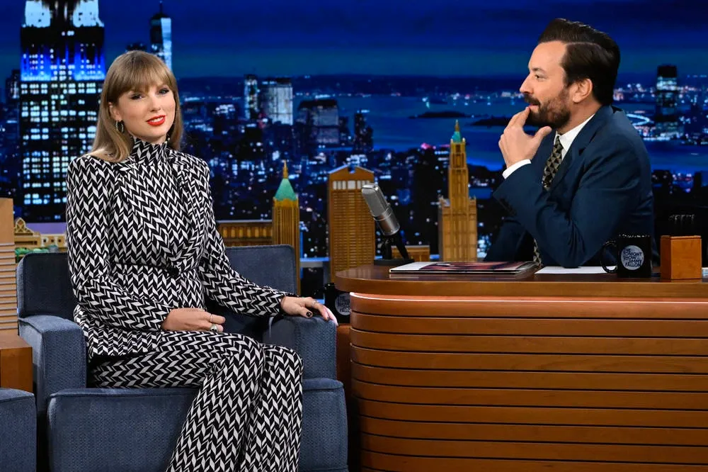 Taylor Swift's in Dorothee Schumacher's Graphic Statement Jacket, Top and Flared Pants on Jimmy Fallon Show (2022)