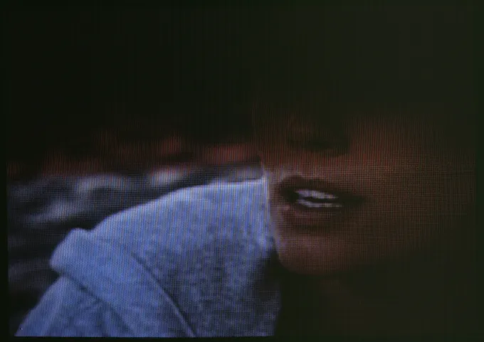 Woman in track & fields sweater (ca. 1996)- alpb